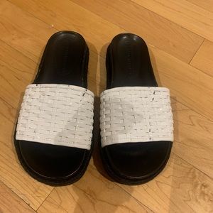 WHITE AND BLACK LEATHER SLIDES